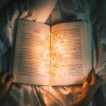 open book with lights emitting from within