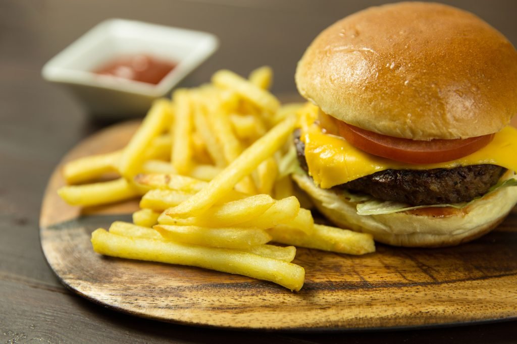 burgers and fries from one of the settings in the new story coming soon from K. D. Capener
